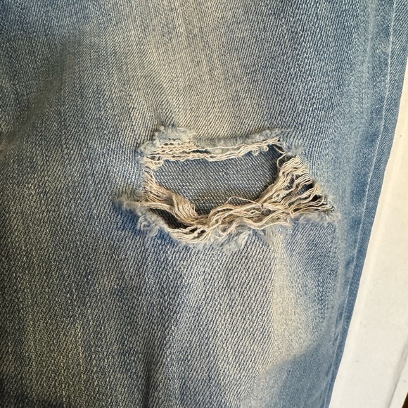 Levi’s Women's High-Rise Skinny Blue Distressed Jeans - Picture 5 of 9